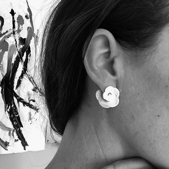 Rosette Studs behind the ear